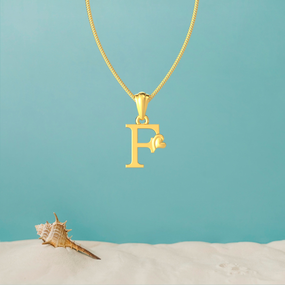 Gold F initial pendant with a lovely heart design
