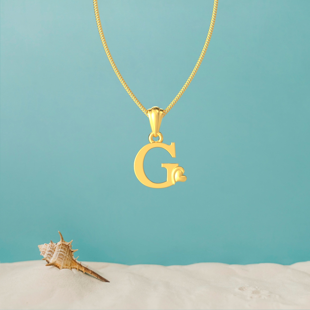 Gold G initial pendant with a lovely heart design